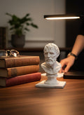 Seneca bust — marble-effect stoic philosopher sculpture on a desk