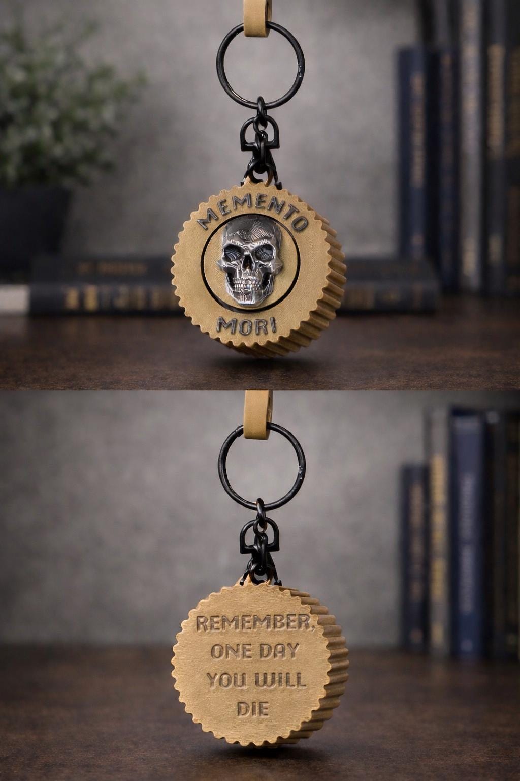 A brown keepsake keychain with a circular tooth-shaped charm engraved with 'MEMENTO MORI' and a skull emblem, shown in two stacked views against a blurred background of books.