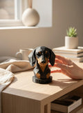 a low poly Black and Tan dog figurine on a shelf